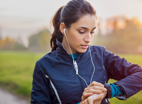 female-runner-checking-watch